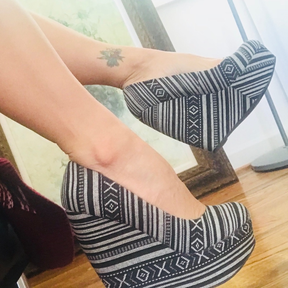 Steve Madden black and white platforms.